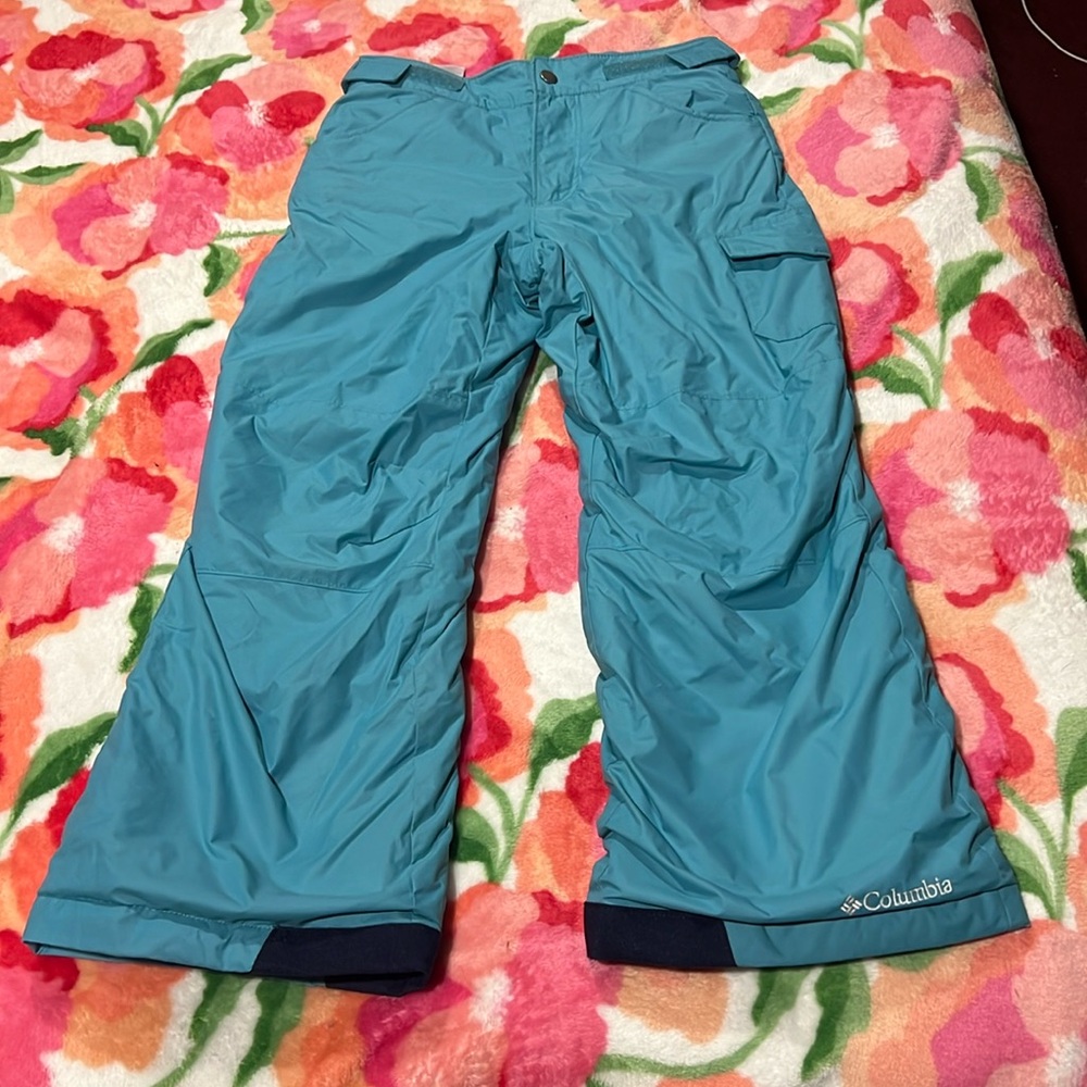 Teal snow pants.